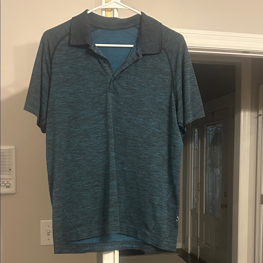 Men's Blue lululemon Polo Shirt no tag but is a medium